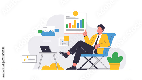 Business professional sitting in a chair reviewing financial charts and graphs on a document with a laptop nearby