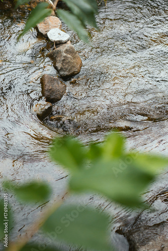 Canvastavla Stepping stones across flowing stream water