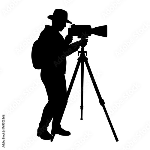silhouette of photographer holding camera and tripod