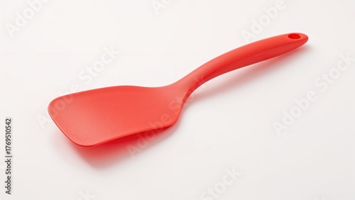 Kitchen rubbery spatula with plastic handle isolated on white background