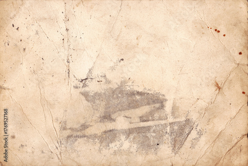 Antique Old Paper Texture Background. Old Antique Paper with Damage Stains. Brown parchment rustic paper sheet with space for text