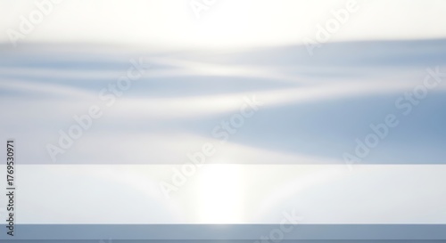 Empty white table top with blurred blue sky background, product display