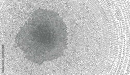 monochrome image featuring dense cluster of gray dots forming circular shape against white background with scattered dots.