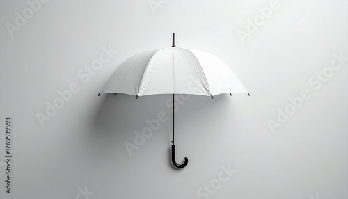 Studio Shot of a White Umbrella on Gray