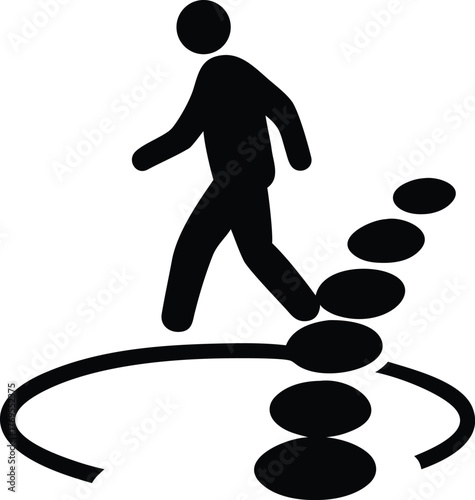 Silhouette of a person walking up a path of stepping stones
