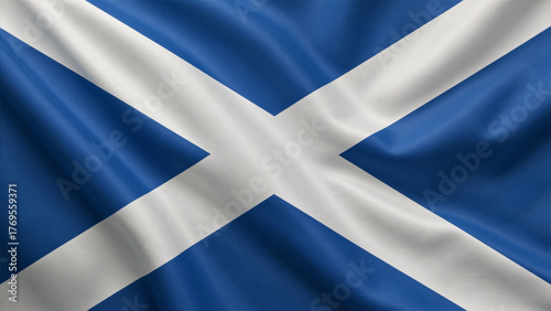 The Scottish flag, the Saltire, waving gracefully, featuring a white diagonal cross on blue