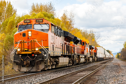 freight train pulling cargo in autumn in Montana