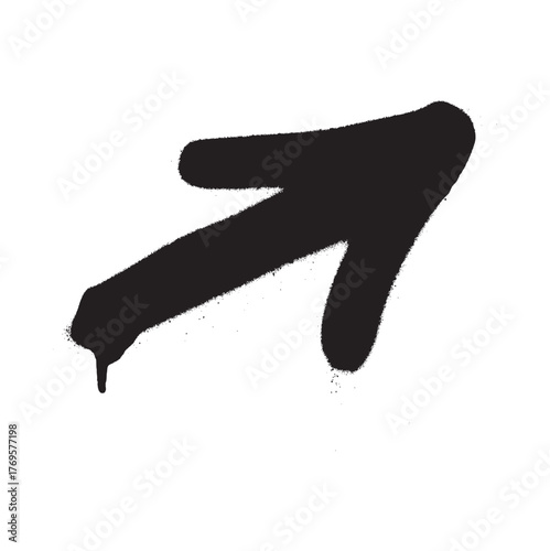 A black spray painted arrow pointing towards the upper right on a plain white background surface