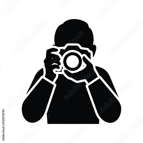 Creative silhouette of a photographer holding a dslr camera capturing a moment isolated on white background