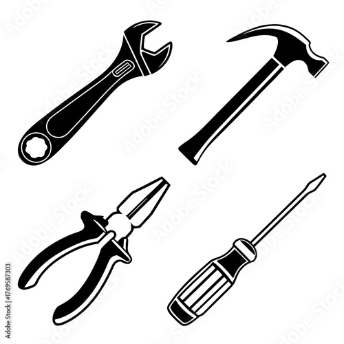 Set of four common hand tools including a wrench hammer pliers and screwdriver isolated on a white background