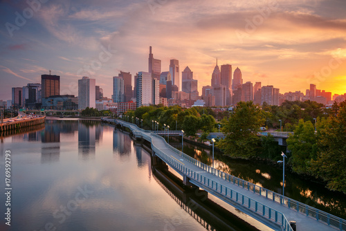 Philadelphia, Pennsylvania, USA. Cityscape image of downtown Philadelphia, Pennsylvania and Schuylkill River leading to the city at beautiful autumn sunrise.