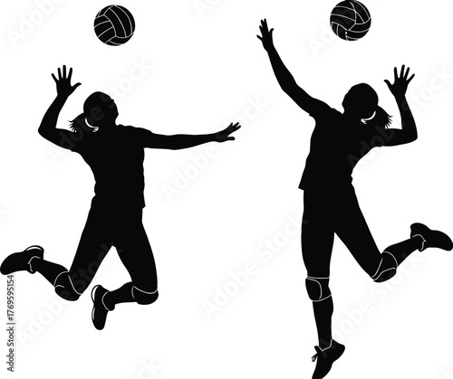 Two volleyball players in silhouette jumping to hit the volleyballs