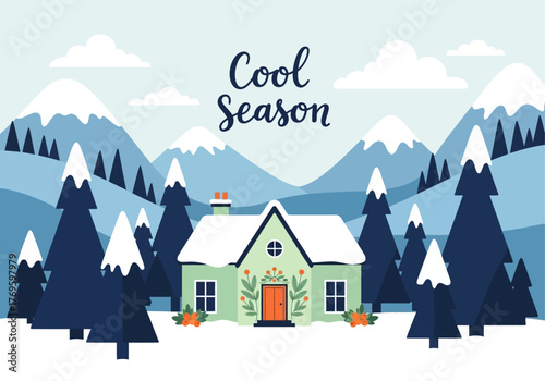 A charming green house nestled amongst snow-covered pine trees with majestic mountains in the background, evoking a cozy winter scene.