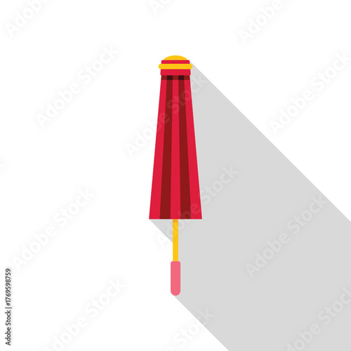 Closed red beach umbrella with stripes and pink handle casting a long shadow, isolated on white background