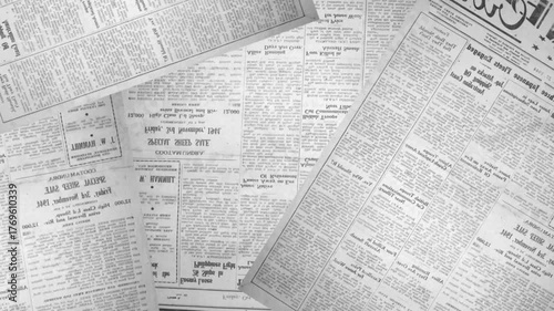 Old torn collage newspaper grunge placard Texture Background or backdrop. Seamless looping