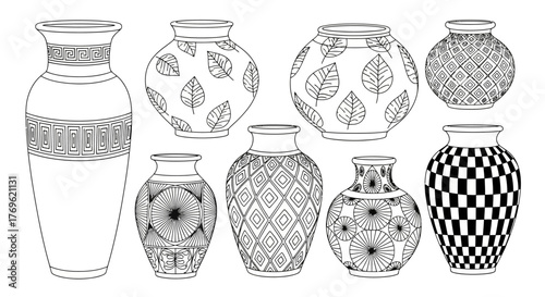 Collection of intricately patterned black and white ceramic vases displayed together