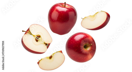 A group of red apples and apple slices floating on transparent background, png
