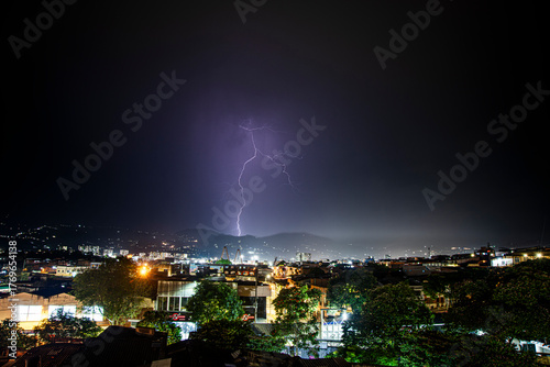 Lightning strikes the city of Pereira at night