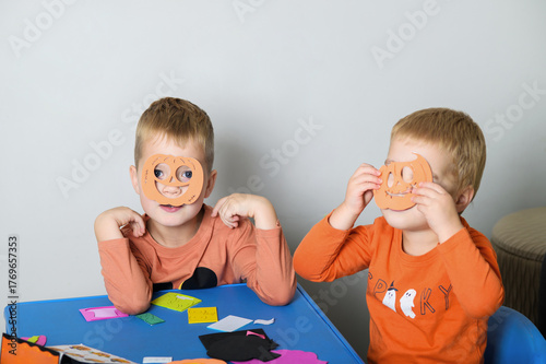 Kids Having Fun with Halloween Crafts and Decorations at Home