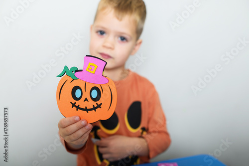 Children Crafting Halloween Decorations at Home