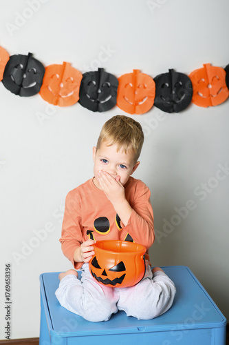 Cute Kids Celebrating Halloween with Pumpkin Buckets and Festive Emotions