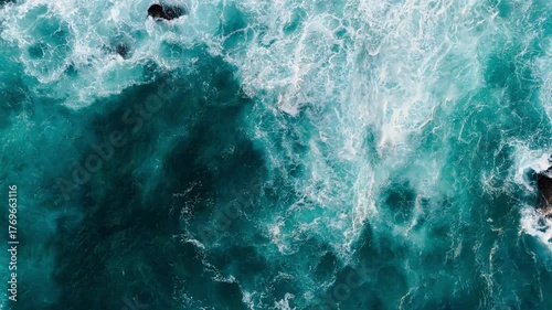 Top aerial view waves Atlantic ocean with foamy white texture, breathtaking deep ocean and big waves