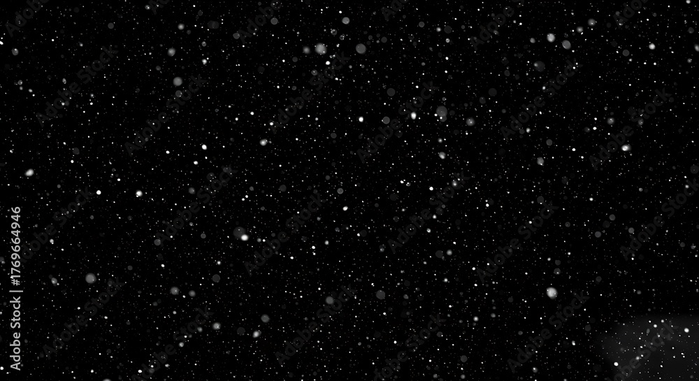 Obraz premium Abstract background of white particles or dust floating in the dark