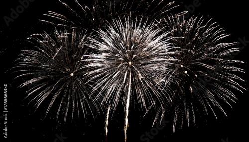 Beautiful illustration of colorful fireworks on plain black background. Colorful Fireworks in black sky background for New Year celebration concept.