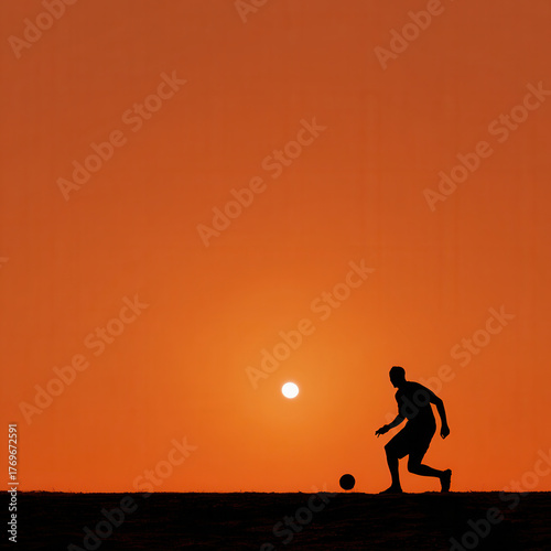 Dramatic Soccer Silhouette: Player Kicking the Ball at Sunrise or Sunset.