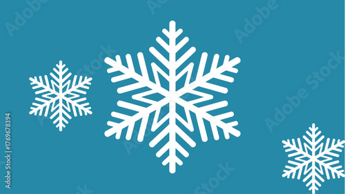 Stunning white snowflakes descend gracefully on a vibrant blue winter backdrop, evoking a magical, festive season atmosphere perfect for holiday designs