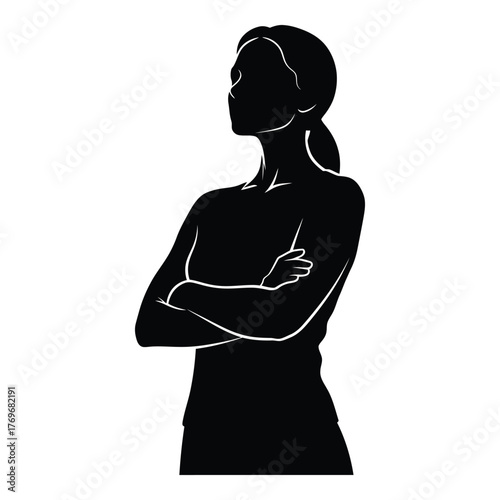 Silhouette of a woman with arms crossed confident professional pose and determined expression silhouette