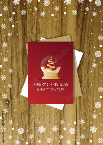 A wooden vertical surface decorated with Christmas decorations, a holiday card lies on the table, creating a warm festive atmosphere