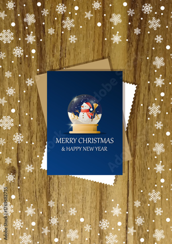 A wooden vertical surface decorated with Christmas decorations, a holiday card lies on the table, creating a warm festive atmosphere