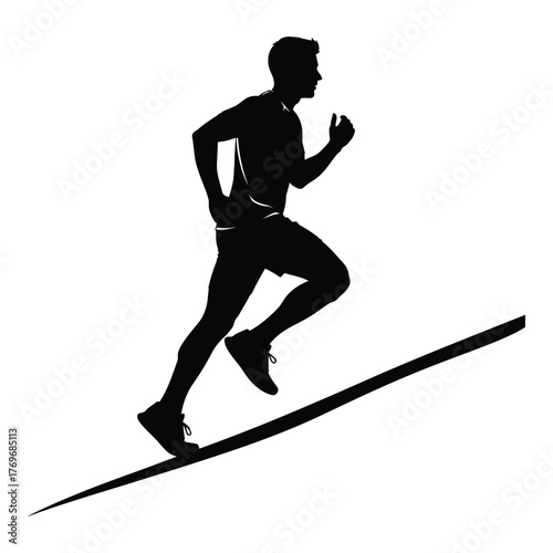 Silhouette of a male athlete running uphill symbolizing determination and fitness goals silhouette