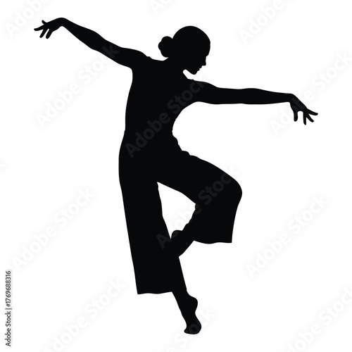 Graceful silhouette of a female dancer in motion capturing elegance and poise silhouette