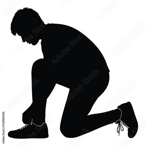 Silhouette of a person tying their shoelaces ready for activity silhouette