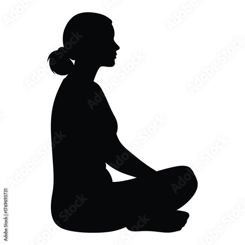Silhouette of a woman meditating in a lotus position peaceful calmness silhouette