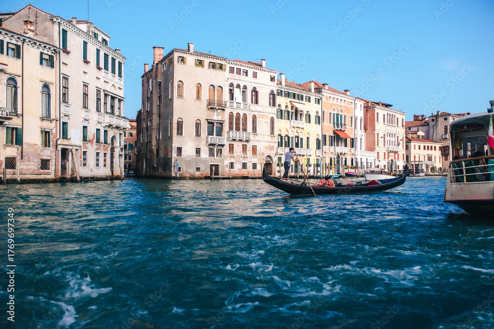 Fototapeta premium Venice Canal View, Romantic Italian Cityscape with Gondolas and Historic Architecture