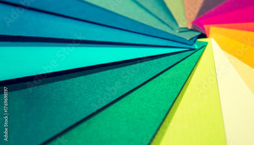 Color palette guide. Colored textured paper samples swatch catalog. Bright and juicy rainbow colors. Beautiful abstract background. Back to school. Office accessories.