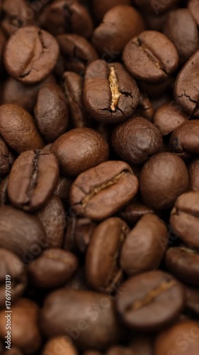 Roasted coffee beans close up, slider shot