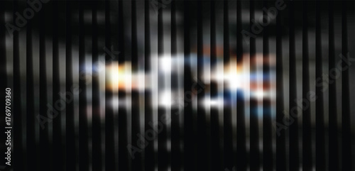Abstract composition of blurred vertical stripes in black, white, and vibrant colors, creating a sense of light and movement in darkness
