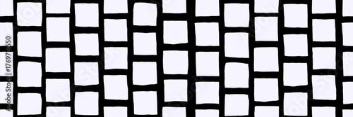 The pattern a drawn rectangle with irregular lines. A hand checks the vector square placed on paper. The shape has a rough edge.