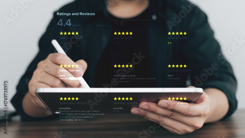 Customer rating and review system on digital tablet with 5-star feedback concept
