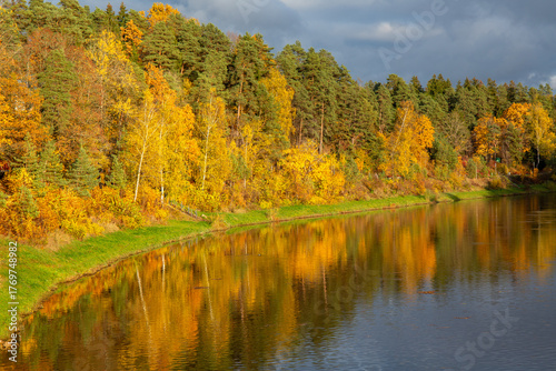 Autumn scene at the river Ogre in Ogre city in October in Latvia