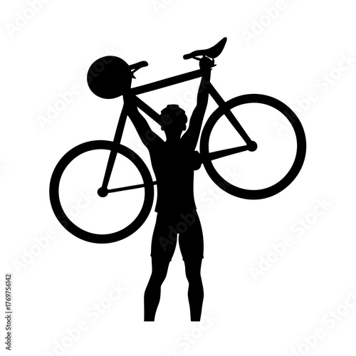Cyclist silhouette holding up bicycle in victory pose