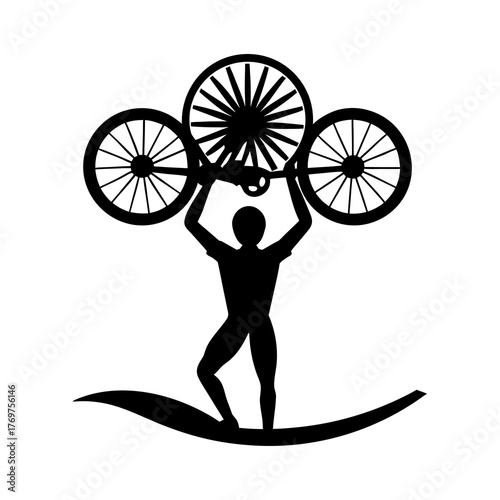 Silhouette of a person holding up bicycle wheels