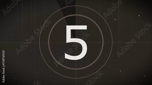 Vintage film countdown timer showing the number five with film grain and scratches retro