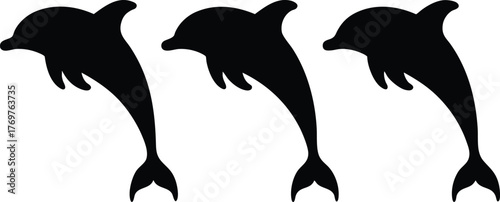 Three black dolphin silhouettes jumping, , perfect for marine life themes
