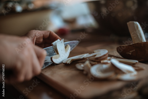 Slicing white mushroom. Preparation for drying