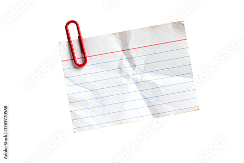 Wrinkled blank index card note with a red paperclip for messages, isolated on transparent background.